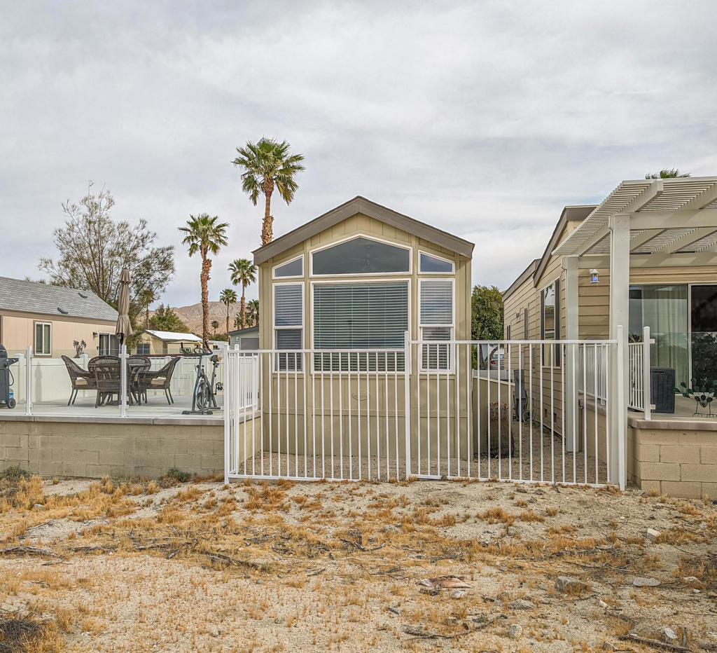 Spectacular and prime location close to the Clubhouse with this 2006 ~400 sq. ft. Laurel Crest Park Model home with sweeping and unobstructed views of Mt. San Jacinto. Come find your vacation getaway to the sun and desert with this immaculate, efficient, and well-maintained 1 bedroom, 1 bath, travertine flooring throughout, modern finishes, and volume ceilings. Sunbathe on your deck surrounded by glass railing for viewing pleasure to take in all the magnificent beauty and desert scenery, additionally, a finished shed with possible washer/dryer connection and a new HVAC system. This jewel is in the premiere Caliente Springs 55+ Resort and offers top notch amenities to soothe your every desire including mineral hot spring fed pool and spas, fitness center, 9-hole golf course, 8-pickleball courts, tennis courts, full laundry facilities, library, chapel services all in a fun and active community. Bring offers, make new friends, and call this home. Lot is not owned; space rent is $811. Easy lender financing (OAC).