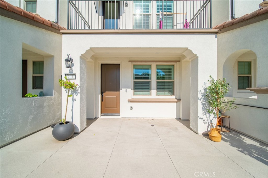 This stunning tri-level townhome, located in Claremont’s highly sought-after Docente community, was built in 2024 and offers sun-filled, stylishly upgraded, move-in ready living. With 3 spacious bedrooms and 3.5 luxurious bathrooms, the home perfectly blends modern elegance with smart functionality. The open-concept living and dining area is bathed in natural light, showcasing sleek quartz countertops, designer cabinetry, warm wood flooring, and premium Samsung appliances, all opening to a breezy private balcony. Designed for today’s lifestyle, the layout features two upstairs primary suites with walk-in closets and spa-like en suite baths, plus a private first-floor guest suite—ideal for visitors or multi-generational living. Enjoy one of the largest gated patios in the community, perfect for relaxing or entertaining, along with a built-in tech center for remote work or study. Additional upgrades include solar panels, smart home features, energy-efficient systems, and an upgraded garage with epoxy flooring and custom cabinetry. Located in a vibrant neighborhood with top-rated Claremont schools, this home offers the ultimate in comfort, style, and convenience. Don’t wait—this rare opportunity won’t last long! Schedule your private tour today!