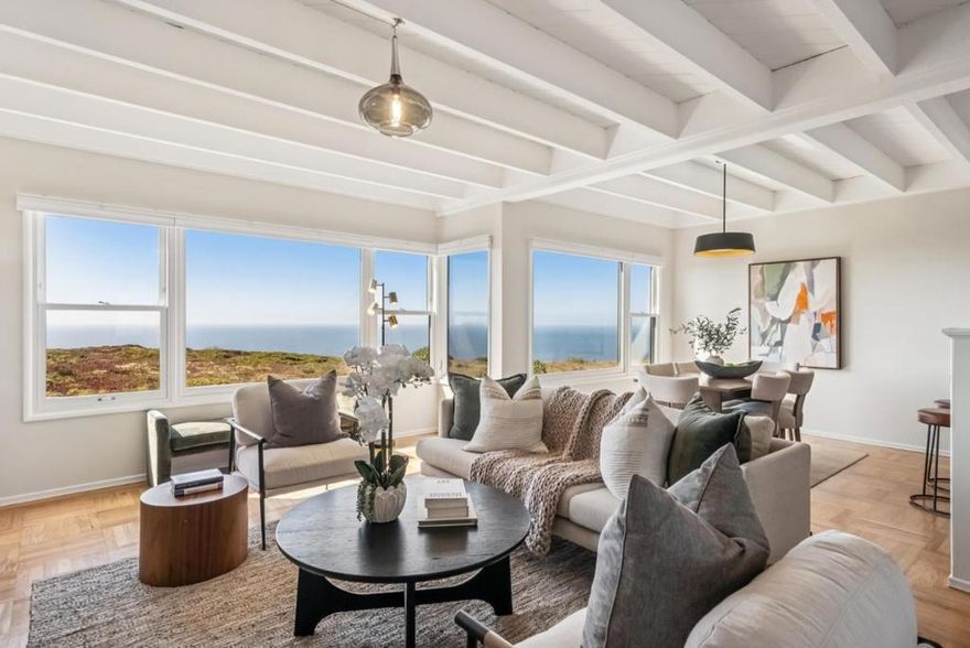 Breathtaking unobstructed ocean, cityscape, Sutro Tower, GG Bridge & Farallon Islands views in this classic mid-century Doelger single-family home. Located in the desirable Westlake Palisades neighborhood and renovated for modern living. An open floor plan features a wall of Marvin dual-paned windows overlooking the ocean and green belt. Fresh paint, refinished solid oak hardwood floors, wood beam ceilings, stylish light fixtures, a remote gas fireplace, & a chef's kitchen with expansive quartz countertops, bar seating, stainless-steel appliances, and modern cabinetry. Four bedrooms include the primary suite, two additional bedrooms, and two remodeled bathrooms upstairs. Custom closet organizers enhance storage. The lower level offers a fourth bedroom with rear yard access, which could also serve as a fantastic family room or home office. Low-maintenance backyard plus a wonderful play and dog park nearby. Significant expansion potential exists in the large two-car garage with exceptional storage. (washer, dryer, and refrigerator remain) Convenient access to San Francisco, Trader Joe's, Westlake, Stonestown, BART, the ocean, the zoo, major freeways, and schools. A perfect mid-century gem, ideal for entertaining or relaxing while enjoying stunning panoramic views from dawn to dusk!