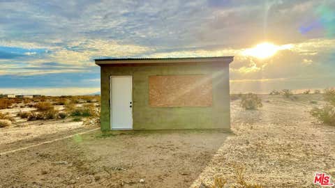 Photo of 1020 Shoshore Valley Road, 29 Palms, CA 92277 (MLS # 26852497)
