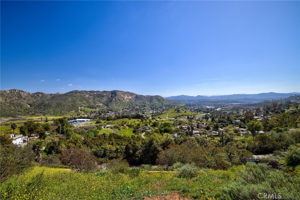 Discover the perfect canvas for your dream home or investment in the heart of Lakeside San Diego! This stunning, just over one-acre parcel, offers serene hillside beauty with panoramic views of Eucalyptus Hills. Nestled in a peaceful yet convenient location, this lot provides the perfect balance of privacy and accessibility. Enjoy the lush greenery that surrounds the property, creating a tranquil retreat while just a short 30 minute drive from San Diego’s top attractions, shopping, dining, and outdoor recreation. With plenty of space to build, this property is ideal for a custom home, a private estate, or even a weekend getaway. Whether you're looking to build your dream home or invest in San Diego land, this rare find in Lakeside and offers endless possibilities. Don’t miss this opportunity—come see the views for yourself!