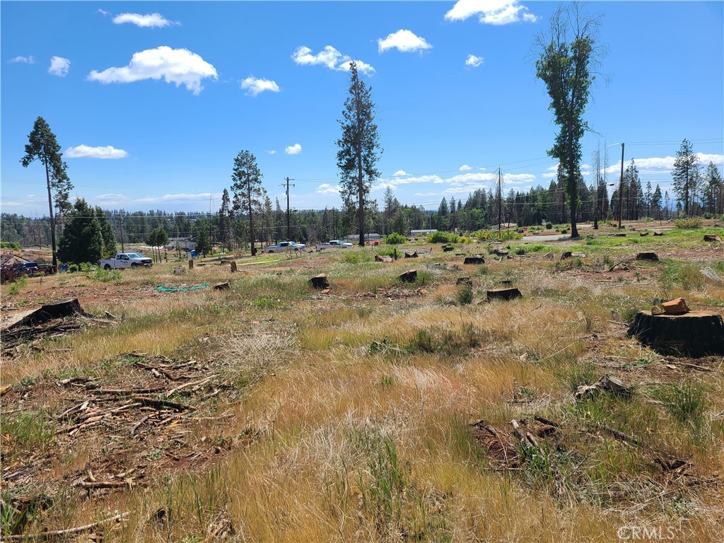 Currently 3 lots available side by side. Corner of Tulsa Ct and Shaw Circle. Lots have been cleared of fire debri and certified. They are ready to put new homes on them. Water and septic system installled, with power available. Manufactured homes were there before fire. Edge of snow line. paved roads.