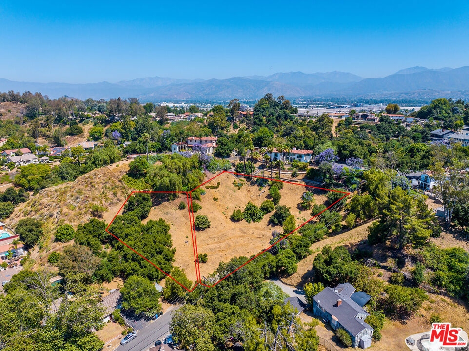 An extraordinary opportunity awaits in the picturesque and sought-after Ganesha Hills neighborhood of Pomona, in the eastern portion of Los Angeles County, where a combined 53,000+ square feet across two adjacent lots presents a unique and strategic offering for the discerning homeowner or visionary developer. Ideal for developers looking to capitalize on the growing demand for prime residential properties in Pomona. Ganesha Hills is known for its upscale homes, expansive views, and historic character. Future owners will appreciate the proximity to the renowned Ganesha Park, Mountain Meadows Golf Club, Puddingstone Lake along with The Claremont Colleges and Cal Poly Pomona, as well as convenient access to major freeways including the 10, 57, and 210. Develop now or hold for future gains in this desirable neighborhood. Developers, investors, or residential buyers: seize this opportunity to create a landmark project in the beautiful Ganesha Hills. Lot APNS: 8360-025-007 & 8360-025-008