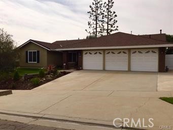 Beautifully updated turn-key home in Fullerton!!! Home boasts genuine 3/4 inch cherry hardwood floors throughout the entire house. Wonderful open floor plan with living room, dining room, family room, breakfast bar & nook. Possible 4 bedroom, 2 Bath; 4th bedroom is currently used as den. New double sink with lots of storage in the guest bath. In addition to the remodel of the kitchen and master bedroom, there is also a brand new air condition and duct system in the house. Brand new large patio cover that wraps around the entire patio. A brand new fence surrounds the peaceful, private yard. Great peek-a-boo views and also views of Disneyland fireworks every night. Spacious 3 car garage with laundry and room for a refrigerator and much more. The house is located in the sought after Sunny Hills School District with Sunset Lane Elementary, Parks Junior High, and Sunny Hills High School.