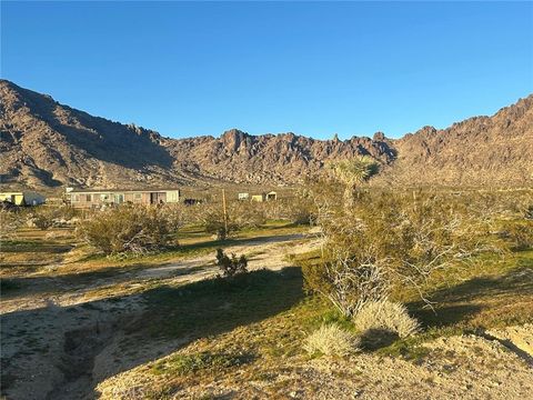 Photo of 30002 Pipeline Rd, Lucerne Valley, CA 92356 (MLS # HD26000922)
