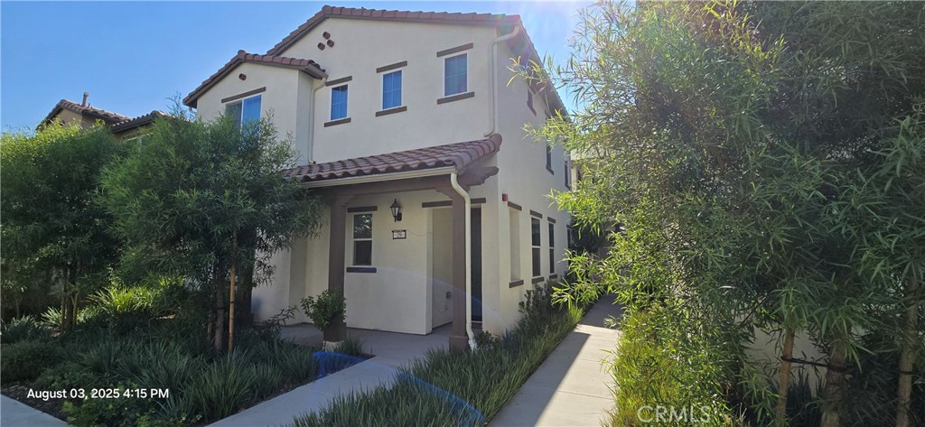 Welcome to Harmony Park a Woodside Home Community located in Loma Linda! Great interior unit location with a front entry off a beautifully maintained greenbelt! Newer build with 4 bedrooms & 3 full bathrooms including 1 bed/bath downstairs! Features downstairs include: Light & bright with tile entry, nice size kitchen w/tile floors, granite counters, breakfast bar, stainless steel appliances, eating area, and sliders to the rear patio & garage. Spacoius family room that's open to the kitchen! There's a full bedroom & bathroom w/walk-in shower downstairs too! Upstairs you have your laundry room, the Primary bedroom with a walk-in closet, and private bathroom w/walk in shower and dual vanities! Two more bedrooms upstairs and a full bathroom with a tub/shower combo and double sinks! 2 Car attached garage with direct access to the home and an automatic garage door opener. This home has Solar included to keep your utility bills low! This is a great location near the Loma Linda VA Clinic and not far from the Loma Linda Medical University and Veterans Hospital. Convenient to local park which has BBQ & eating area, basketball court, pickleball, horseshoes, tot lot, & more! Landscaping is included. ***Washer, Dryer, & Fridge included!***