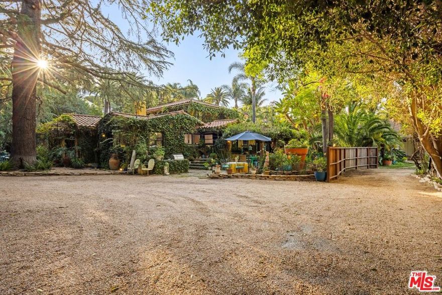 Welcome to the John Witherspoon Estate, a true hidden gem tucked away on a spacious, flat lot. This property presents a rare opportunity to create a double lot property with over 25,000 square feet by acquiring the neighboring home at 14949 Valley Vista Boulevard.  These two exceptional residences beautifully embody the charm of the European countryside, providing the privacy and tranquility that many desire. With a rich history as a vibrant hub for creative gatherings, these homes are full of personality and artistic style, making them truly one-of-a-kind. This Sherman Oaks Estate offers the perfect balance of seclusion and accessibility. You're just 30 minutes from downtown, 20 minutes from brunch at the Polo Lounge, and Malibu's beaches are just 45 minutes away. Meanwhile, Ventura Blvd offers nearby dining at Mel's Diner and Anajak Thai. Please head to the other listing, 14949 Valley Vista, for more details and pricing.