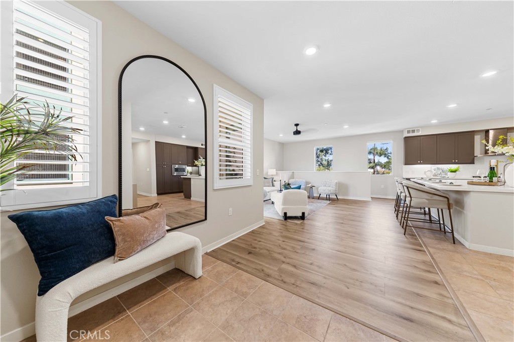 This stylish single-level 2-bedroom, 2-bathroom flat is situated in a prime location, offering easy access to the beach, UCI campus, airport, and major highways. A unique feature of this home is its private 2-bay tandem garage with additional storage space, a rare find in the building.
Inside, the open-concept design seamlessly connects the great room, modern kitchen with an island, and a spacious balcony—perfect for relaxation or entertaining. Both bedrooms are generously sized, each featuring a walk-in closet and a private bathroom for ultimate comfort and convenience.
A perfect blend of location, functionality, and style—ideal for those looking for a vibrant yet comfortable living space!