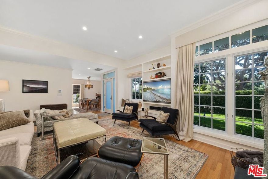 Come and see this elegant home in a perfect location, just a block north of the heart of the Montana Ave shops & restaurants and in the coveted Franklin school district. This is a private contemporary, remodeled gem, boasting hardwood floors, light-filled rooms and a back yard (with new pool & spa) that's an entertainer's dream. The spacious living room features an imported, antique French wood-burning fireplace and an abundance of windows looking out on to the front yard, made private by mature hedges. The spacious dining room features a beautiful Art Deco chandelier.  The custom chef's kitchen features top-of-the-line appliances and flows to dining area and out to the lush back yard.The sumptuous primary suite is on the main level & includes his and hers closets and flows to the back yard with pool. The luxurious, marble primary bath features a spa-like custom steam shower, a separate tub & marble vanity with double sinks. On the upper level you'll find three additional, good-sized bedrooms, two of which have a balcony or deck. One of the upstairs bedrooms is ensuite, the other two share a bath.The resort-like back yard boasts abundant seating & dining areas, a brand new, perfect-size pool and spa with retractable, motorized cover; not to mention the separate 1,200 bottle wine room and the gym off the garage. Please see the "Docs" link for the floorplan and recent improvements.  Please see the "Virtual Tour" link for the 3-D  virtual tour.