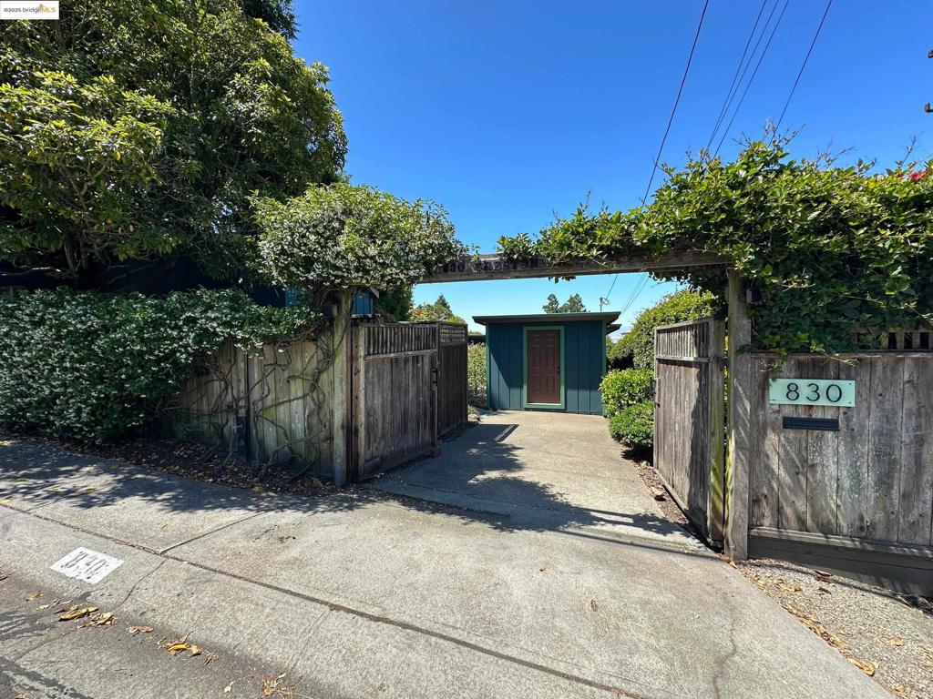 Discover this charming 3-bedroom, 2-bathroom cottage in Berkeley, complete with a detached studio with a sleeping loft or use as an artist retreat.. Enjoy breathtaking views of the San Francisco Bay and Golden Gate Bridge from the expansive rear deck. Recent upgrades include an updated mini-split HVAC system and tankless water heater. The private front courtyard and vegetable garden add to its allure. Conveniently located near Grizzly Peak Blvd with easy access to public transport. This home offers a perfect blend of tranquility and city living.