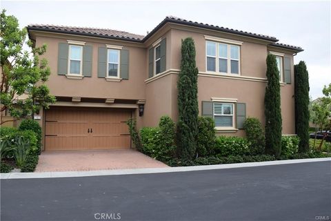 Photo of 183 Desert Bloom, Irvine, CA 92618 (MLS # OC26048036)