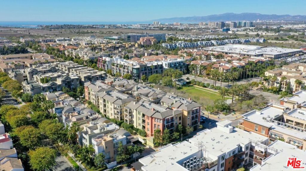 Welcome to Unit 415 at 13020 Pacific Promenade, a beautifully appointed top-floor 2-bedroom, 2-bath condo located in the heart of Playa Vista. This light-filled residence offers approximately 1,300 square feet of open-concept living with high ceilings, expansive windows, and tasteful finishes throughout. The modern kitchen features stainless steel appliances, granite countertops, and a breakfast bar that flows into the spacious living and dining areas. The primary suite includes a large walk-in closet and an ensuite bathroom with dual vanities and a glass-enclosed shower. Enjoy in-unit laundry, central HVAC, and two assigned tandem parking spaces in a secure garage. All utilities, water, trash collection, high-speed internet, HOA dues, and Playa Vista amenities are includedan added value of over $1,000 per month. Residents have access to The Resort gym and pool, the Centerpointe Club, business center, parks, trails, and sport courts. Ideally situated within walking distance to Whole Foods, Starbucks, Cinemark, restaurants, Cedars-Sinai, and more, with convenient access to Google, Meta, Amazon, and LAX. No smoking. A small dog will be considered. See private remarks for showing instructions.