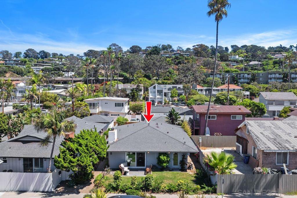 Experience the ultimate in coastal living in this fully remodeled Del Mar Beach Colony home - right along the coast, just a few steps to the sand and waves, and a short walk to Del Mar Plaza and Powerhouse Park. This home perfectly combines modern comfort with timeless elegance, making it an excellent option for short-term rentals or long-term leases. Its prime location in a prestigious neighborhood and top school district makes it an ideal fit for executive family relocation. The property boasts a seamless indoor/outdoor flow, with a semi-enclosed front yard accessible from both the living room and kitchen. The backyard is a serene retreat featuring a dining terrace, and lush lawn, offering a perfect space to create your private oasis . The home has a two-car garage and every space is thoughtfully designed to provide intimate comfort while showcasing ocean view, truly capturing the iconic Del Mar lifestyle. You'll be minutes away from downtown Del Mar, Flower Hill Promenade, Del Mar Highlands Town Center, and Rancho Santa Fe, with abundant dining, shopping, and grocery options. Enjoy an stress-free commute to business, educational, and leisure destinations, all from the comfort of your Del Mar home.
