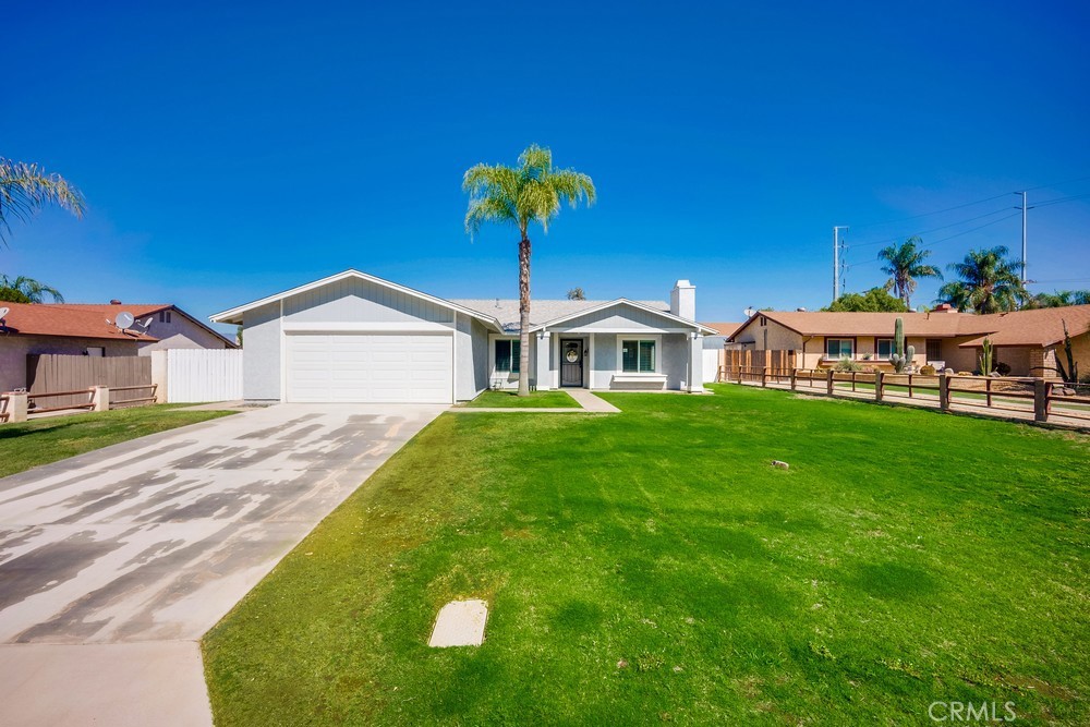 Welcome to 29161 Allan Street, a beautifully updated single-story home in Lake Elsinore offering a bright layout, modern finishes, and a spacious yard ideal for both relaxation and entertaining. A brand-new HVAC system with ductwork was installed in July 2025 with a total upgrade cost of $16,000, ensuring year-round comfort and efficiency. Additionally, in July, the septic system was professionally serviced, and two green risers were installed at a total cost of $1,550.
The home sits on a large front lawn with a recently added palm tree and a long driveway leading to a two-car garage.
Inside, you’re greeted by an open living area with a cozy fireplace framed in sleek gray brick. The space flows seamlessly into the kitchen and dining room, creating a natural hub for everyday living. The kitchen features striking white marble waterfall counters, a glossy light-gray tile backsplash, and a mix of white and soft gray cabinetry. Updated appliances, recessed lighting, and light wood-style floors complete the fresh, modern feel. A sliding glass door off the dining area brings in natural light and opens to the expansive backyard.
Down the hallway, you’ll find built-in cabinetry, a full bathroom, and three comfortable bedrooms. The spacious primary suite offers its own ensuite bathroom, sliding glass doors for backyard access, and mirrored closet doors. Two additional bedrooms provide ample storage with mirrored closets and ceiling fans, while both bathrooms showcase updated finishes with sleek black fixtures.
The backyard is truly a highlight—offering a generous patio and a massive yard on a lot just over 20,000 sq ft, providing endless possibilities. Whether you're envisioning a swimming pool, custom landscaping, or even adding a second property or ADU, there's plenty of space to make it your own. The attached two-car garage provides extra storage and includes the laundry area for added convenience.
Included with the sale at no additional cost are the following items: refrigerator, stove, TV in the living room, TV in the smallest room, TV in the garage, three Ring cameras on the property, metal shelves in the garage, washer and dryer (both located in the garage), and window shutters, which come with a lifetime home warranty.
With its modern updates, flowing floor plan, oversized lot, and expansive outdoor space, 29161 Allan Street is a turnkey opportunity to enjoy comfortable living with exceptional potential in a great Lake Elsinore location.
