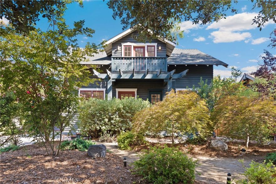 If every house tells a story, what tales the Emma M. Black House would tell! Designed by famed architects Greene and Greene, this 1903 character filled home is a testament to craftsmanship, pride of ownership, and Southern California living. Moved from its original location on Pasadena’s Madison Avenue in 1999, this historically designated property is at home in the Garfield Heights Historic District and offers both style and functionality. The 3-bedroom/ 4-bathroom main house greets you with a welcoming porch, gleaming hardwood floors, and lovely period windows that bathe the home in natural light. The three upstairs bedrooms offer amazing views of the San Gabriel mountains and surrounding picturesque neighborhood, with the primary and secondary bedrooms having their own full ensuite bathrooms and the third its own private balcony overlooking the canopy of Oak and Deodar Cedar trees. Amazingly, the home features a roughly 800-square basement, a rare find that invites customization in catering to an array of lifestyle needs. The modern convenience of two washer-dryer hookups on both the first and second floors blends beautifully with more charming aspects like the peekaboo windows in the walk-in closets, pocket doors between the living room and family room and the built-ins adorning the cozy kitchen. The sweet one-bedroom/ one-bathroom cottage with kitchenette awaits rejuvenation, offering the opportunity to reimagine an existing space to suit your own personal invention and taste.  With a deep, private lot allowing plenty of parking, and a 2-car garage perfect for storage or enjoying hobbies, this beautifully landscaped home is a true one of a kind Pasadena treasure.