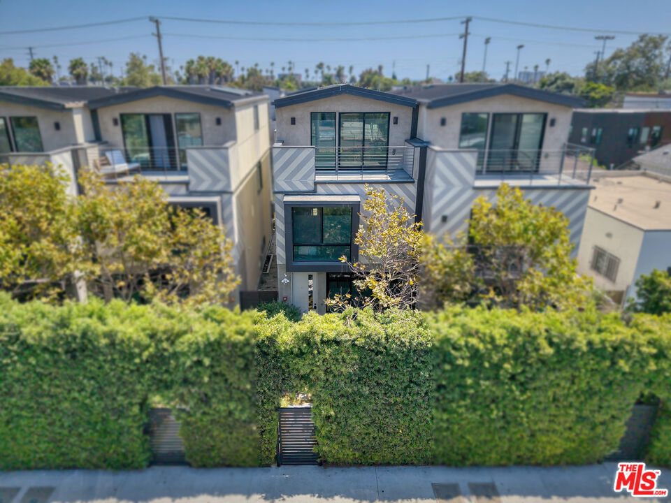 Completed in 2019, this modern and sustainable LEED Gold-certified single-family residence offers 3 spacious bedrooms plus a detached guest house with a rooftop deck, ideal for a home office, creative retreat, gym, or entertaining guests. Inside the main home is an open-concept layout, chef's kitchen, and abundant natural light, creating an inviting setting for everyday living and entertaining. Thoughtfully designed in an exceptional location, the home also presents a unique opportunity to add value with cosmetic updates. Just blocks from Abbot Kinney, the beach, and some of LA's best cafes, boutiques, and restaurants, this is a rare opportunity to own a retreat in one of the city's most iconic neighborhoods.