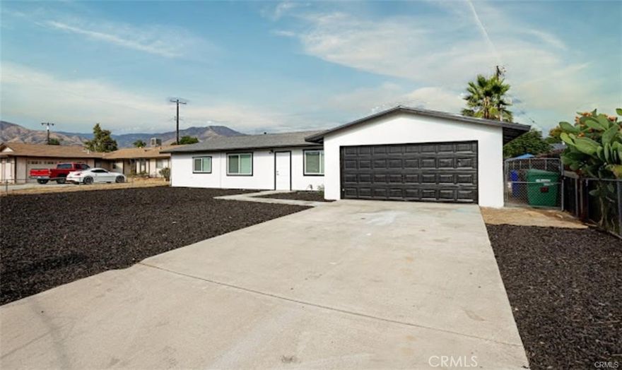 Welcome to Your Beautifully Renovated Highland Home! Nestled in the heart of Highland, this stunningly renovated home perfectly blends modern upgrades with timeless comfort, ideal for both relaxed living and effortless entertaining. Step inside to an open, light-filled floor plan featuring brand-new vinyl wood flooring that flows seamlessly throughout the living areas. Expansive dual-pane, energy-efficient windows flood the home with natural light while helping to keep utility costs low all year round. A new roof adds peace of mind and long-term value. The spacious living room offers the perfect setting for gatherings with family and friends, while the fully updated kitchen is sure to impress with abundant cabinetry, sleek finishes, and generous counter space—ideal for both everyday meals and special occasions. Bedrooms are generously sized, offering flexibility for family, guests, or a home office. Both bathrooms have been tastefully updated with clean, modern touches. Step outside to your private backyard, perfect for weekend barbecues, gardening, or simply soaking up the California sunshine. With ample space to customize, the possibilities are endless. Additional features include a large driveway with ample parking and direct access to the attached garage for added convenience. Located in a desirable neighborhood, this home is just minutes from top-rated schools, parks, shopping centers, and major freeways—making commuting and daily errands a breeze. Don’t miss this opportunity, schedule your private showing today and fall in love with your next home!