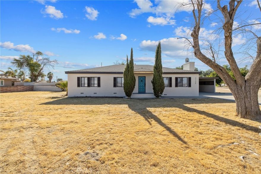Country Living! FHA Ready! 3 Bed, 2 Bath + ADU Potential on Nearly 1 Acre. USDA financing available! This move-in-ready, beautifully remodeled home blends classic charm with modern comfort on an oversized lot. Large windows fill the home with natural light, while hardwood floors and a cozy fireplace complete the inviting living room ambiance. The updated kitchen features new granite countertops and appliances, flowing seamlessly into the dining area and spacious living room, perfect for gatherings. For added peace of mind, the home includes a 2-year Roof Certificate and Termite Clearance. Conveniently located near the Lemoore Naval Base.