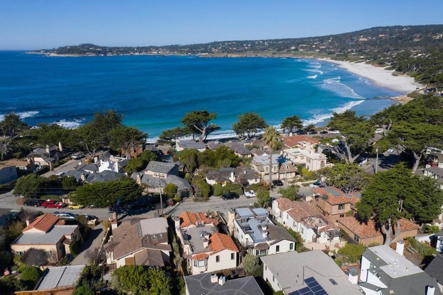 Located on one of Carmel's most sought after streets, this ocean view, 3 bedroom, 3 bath Carmel Point beach house greets you with an abundance of natural light, elevated and exposed wood beamed ceilings and a ground floor master suite with direct access to a private, sunny patio. Take in ocean views or admire the world famous topography of the Pebble Beach Golf Links from the spacious, west facing deck or delight in a short stroll to the beach located just a block away.