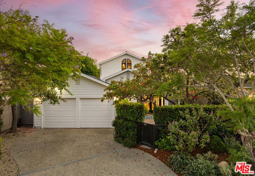 Set in the privacy of Santa Barbara's coveted Eucalyptus Hill, this beautifully reimagined farmhouse-style retreat is more than just a home. It is a story of style, comfort, and effortless California living. Thoughtfully remodeled, it offers the best of both worlds: tranquil ocean and mountain views paired with a rare sense of serenity, all just moments from everything Santa Barbara and Montecito have to offer. From the moment you arrive, a sense of welcome unfolds. A lush courtyard anchored by a glowing firepit sets the tone, a space made for morning coffee beneath the trees or relaxed evenings under sunset skies. Inside, skylights illuminate vaulted tongue and groove ceilings, exposed beams, and bamboo wood floors. Character and thoughtful touches make this home truly unique, with every detail from artisan finishes to a warm and well considered layout reflecting a sense of ease and intention. The heart of the home is the kitchen, a beautifully designed space with a generous center island, custom cabinetry, and professional grade appliances. It flows effortlessly into a dining area with a built-in banquette and a living room centered around a handmade cement tile fireplace that radiates charm and warmth. Life here extends seamlessly outdoors. French doors lead to an inviting patio with a built-in barbecue and a comfortable seating area, perfect for entertaining and dining under the stars. A refreshing outdoor shower adds a touch of coastal ease after beach days or time spent in the garden. A versatile shed with bamboo floors and lighting enhances the property, ideal as an artist's studio, home office, or serene retreat. Upstairs, an airy open concept bedroom offers a peaceful escape with vaulted ceilings, a cozy fireplace, and a beautifully designed bathroom that feels like a private spa. French doors open to a terrace framing ocean and mountain vistas, where a spiral staircase leads gracefully down to the backyard. This inviting space is perfect for unwinding, reading, or watching the sun rise and set, a daily reminder of the beauty that surrounds you. More than a home, this property is a place to slow down, savor the natural beauty around you, and experience the very best of California coastal living.