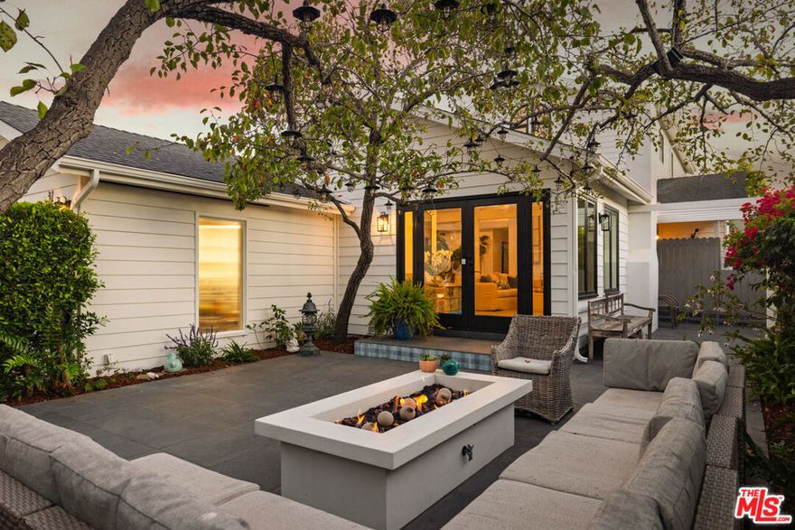 Set in the privacy of Santa Barbara's coveted Eucalyptus Hill, this beautifully reimagined farmhouse-style retreat is more than just a home. It is a story of style, comfort, and effortless California living. Thoughtfully remodeled, it offers the best of both worlds: tranquil ocean and mountain views paired with a rare sense of serenity, all just moments from everything Santa Barbara and Montecito have to offer. From the moment you arrive, a sense of welcome unfolds. A lush courtyard anchored by a glowing firepit sets the tone, a space made for morning coffee beneath the trees or relaxed evenings under sunset skies. Inside, skylights illuminate vaulted tongue and groove ceilings, exposed beams, and bamboo wood floors. Character and thoughtful touches make this home truly unique, with every detail from artisan finishes to a warm and well considered layout reflecting a sense of ease and intention. The heart of the home is the kitchen, a beautifully designed space with a generous center island, custom cabinetry, and professional grade appliances. It flows effortlessly into a dining area with a built-in banquette and a living room centered around a handmade cement tile fireplace that radiates charm and warmth. Life here extends seamlessly outdoors. French doors lead to an inviting patio with a built-in barbecue and a comfortable seating area, perfect for entertaining and dining under the stars. A refreshing outdoor shower adds a touch of coastal ease after beach days or time spent in the garden. A versatile shed with bamboo floors and lighting enhances the property, ideal as an artist's studio, home office, or serene retreat. Upstairs, an airy open concept bedroom offers a peaceful escape with vaulted ceilings, a cozy fireplace, and a beautifully designed bathroom that feels like a private spa. French doors open to a terrace framing ocean and mountain vistas, where a spiral staircase leads gracefully down to the backyard. This inviting space is perfect for unwinding, reading, or watching the sun rise and set, a daily reminder of the beauty that surrounds you. More than a home, this property is a place to slow down, savor the natural beauty around you, and experience the very best of California coastal living.