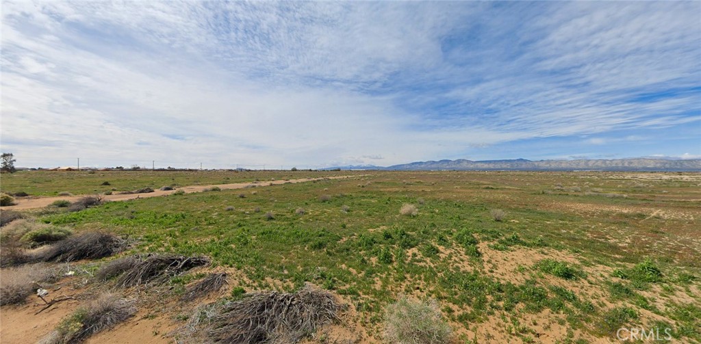 Strategic 0.169-acre corner lot at Denhart Ave and 85th St in California City offers exceptional desert investment potential at $18,000. This flat, buildable parcel sits just 4 miles from California City Airport with year-round dirt road access and power lines approximately 1000 feet south on Mendiburu Road. Zoned for residential development, this well-positioned lot features typical desert shrub topography ideal for construction and septic installation. Located in Kern County's expanding market, the property provides easy highway access to Edwards Air Force Base (25 miles) and Los Angeles metro (120 miles) while maintaining desert tranquility. Buyers will need to drill well for water and install septic system. Perfect for off-grid living, investment holding, or future development in this growing high desert community. The corner location offers multiple access options and enhanced development flexibility. GPS coordinates 35.14336, -117.97818 place this parcel in an area experiencing steady growth from aerospace industry and industrial development. Utilities to be verified by buyer. Cash offers preferred for quick closing on this affordable California land opportunity.