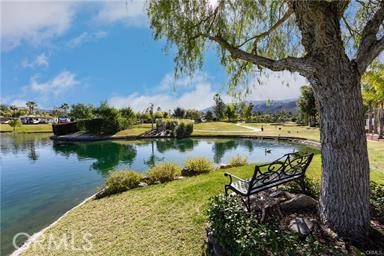 Gorgeous Golf Course and Pond Views of Holes 6, 7 & 11. Pond Views directly maybe 15 feet out the back yard with lots of room to enjoy the Huge shade Tree & grass area. The sunsets out the front make for amazing evenings. The club house is right around the corner. Bring your ideas for a Build-Out and Enjoy the Outdoors. Included in Rancho California RV Resort is a 14 hole Executive Golf Course that is free for owners, 5 Pools and Jacuzzi areas, Tennis Courts, Pickle Ball Courts, Laundry Rooms, Dog Park, Horse Shoe Lawn, Club House, Hiking Trails, and Restaurant all inside Gated Community that is Guarded 24/7. You can live here or rent your space. Peace and quiet serenity all just 25 minutes from Temecula Wine Country. No age restrictions. Come on over and check this hidden gem of a place out. Financing Available....
