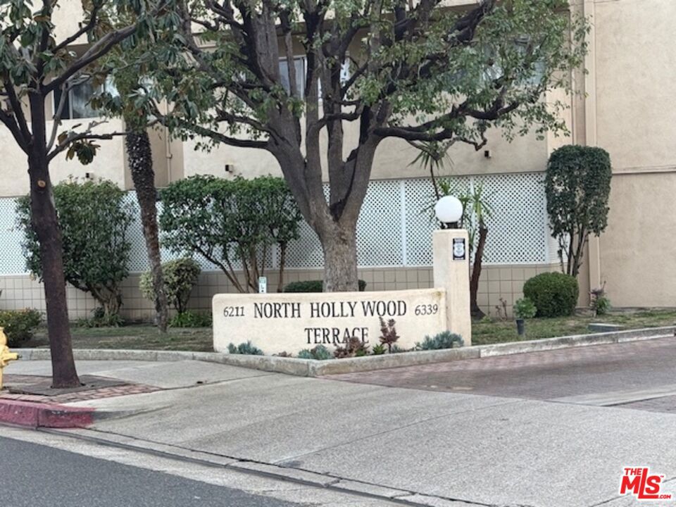 Welcome to this beautifully updated 3-bedroom, 2-bathroom condo located in the heart of the highly desirable North Hollywood/Valley Glen neighborhood. This light-filled unit has been recently painted and thoughtfully designed to offer both comfort and functionality. The modern kitchen features a gas cooktop, built-in microwave, and a convenient breakfast bar, perfect for casual dining. The open-concept layout seamlessly connects the dining area to the expansive living room, complete with recessed lighting, sleek laminate flooring, and direct access to a private balcony ideal for relaxing or entertaining guests. The spacious primary suite serves as a tranquil retreat with a full en-suite bathroom, a generous walk-in closet, and a secondary organized closet for added storage. Two additional bedrooms also feature custom closet organization, providing ample space for family, guests, or a home office. Additional features include central air conditioning and heating, one assigned carport parking space, and the option to rent an additional space through the HOA. Residents of this well-maintained community enjoy a variety of amenities, including three sparkling pools, a recreation room, children's playgrounds, and multiple laundry facilities throughout the complex. Centrally located near the 101 and 170 freeways, this home offers easy access to shopping, dining, markets, and the vibrant NOHO West Plaza. Don't miss this fantastic opportunity to own a home in one of the Valley's most sought-after neighborhoods!