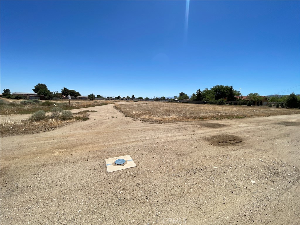 Discover an exceptional opportunity with this spacious 1.26-acre lot located in one of Palmdale’s most convenient and connected areas. Tucked just off Palmdale Blvd, this flat and usable parcel sits near well-established homes, local schools like Tamarisk Elementary, and a variety of everyday amenities including shopping, dining, and services. With nearby access to the 14 Freeway, this centrally positioned lot is ideal for those seeking to build in a neighborhood that blends accessibility with community charm. Whether you're planning a custom home or future investment, this well-located property offers flexibility, potential, and a desirable lifestyle backdrop.