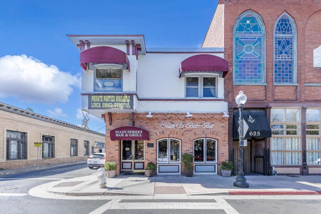 *Marketing package available upon request* Yellowstone Investments has been selected to exclusively market for sale 627 Main Street, a 4,512 square foot building located in the heart of Suisun City. This prime commercial real estate opportunity offers an established business along with the property in a highly desirable corner location. The building spans two floors, designed to accommodate various functions. On the first floor, you'll find a fully equipped restaurant and kitchen ready for continued operations or new culinary concepts. The second floor features a full bar, an event room perfect for hosting private parties or gatherings, and an office space for managing business operations efficiently. Located in the Main Street Mixed Use (MSMU) zone, the property benefits from zoning that allows for a wide array of businesses, offering great flexibility for future endeavors. The sale of the property includes not only the real estate but also the business itself, which has been thriving for over 17 years. With a loyal and recurring customer base, this is a rare opportunity to own both a successful, well-established business and a prime piece of real estate in the heart of Suisun City.