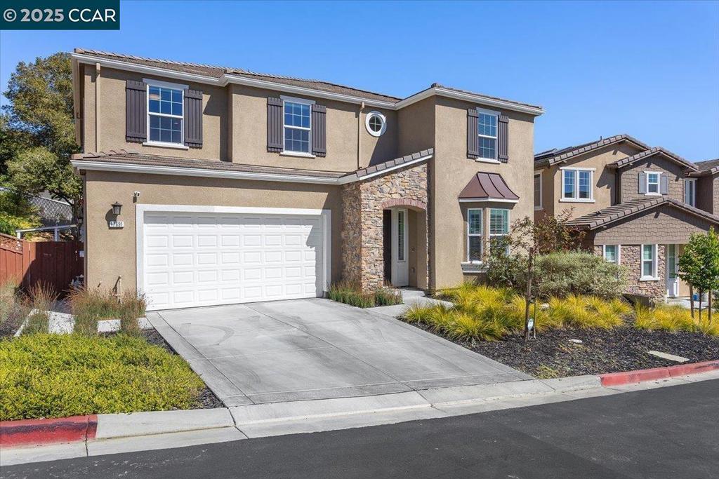PRICE IMPROVEMENT! Contemporary Upper Valley home offers high-end design, thoughtful functionality & indoor-outdoor living. The open-concept floor plan feats. a chef’s kitchen w/oversized island, built-in Thermador SS appliances & walk-in pantry. Sun-drenched great room w/fireplace, media center & motorized window shades connects to the kitchen. Wine lovers will appreciate the walk-in cellar & under-counter wine fridge. Downstairs also boasts a large bedroom & full hall bath - perfect for guests or home office. Upstairs, a spacious loft provides flex living space, plus a primary suite, 2 add.'l bedrooms, one full bath & laundry room. Expansive primary suite w/customized walk-in closet & spa-inspired en-suite bath w/dual vanities, soaking tub & walk-in shower. Outdoors, enjoy a low-maintenance backyard w/artificial turf, Trex deck, built-in outdoor speakers & a 20-ft heated swim spa w/swim-in-place current for year-round relaxation. Finished 2-car garage w/epoxy flooring, custom storage & a bike wall rack. Sustainable living is made easy w/paid solar system, battery backup & a Tesla Wall Connector. High-end finishes includ: 10 ft. ceilings, engineered hardwood floors, Cat-6 wiring & smart-home upgrades. Close to Proctor School, Parks & Trails! Open Sun 8/17 1:30 to 3:30