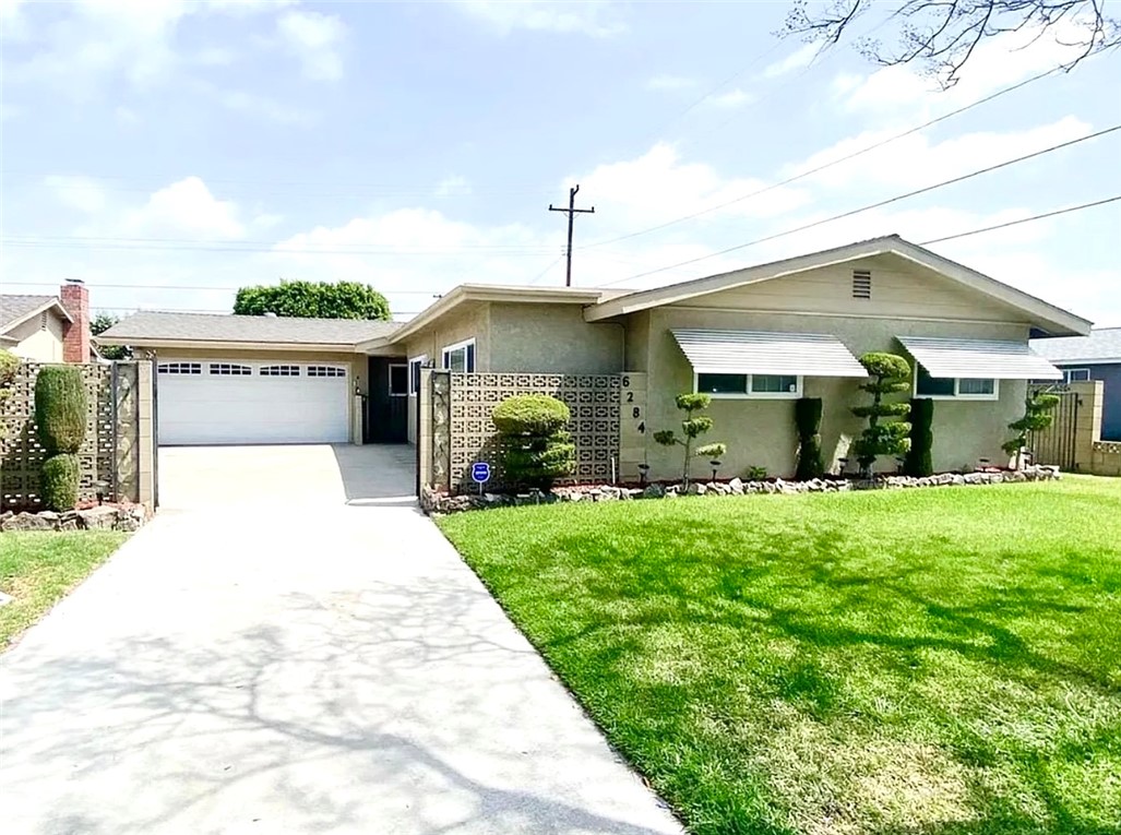 Welcome to 6284 San Ramon Way, Buena Park, CA!
This charming single-family home offers the perfect balance of comfort, space, and functionality, with 1,791 square feet of well-designed living area. Featuring four spacious bedrooms and two bathrooms, this home offers flexible space options! Inside, you'll find a warm and inviting interior with a thoughtful combination of carpet, laminate, and tile flooring, and original details that add charm throughout this home. The cozy living room centers around a classic fireplace, making it the perfect spot to unwind or enjoy a nice evening at home. Step outside to your private backyard oasis, ideal for outdoor dining, gardening, play, or simply soaking up the California sunshine. The expansive yard offers endless potential for personalization and relaxation.
Nestled in a sought-after Buena Park neighborhood, this home combines peaceful suburban living with convenient access to local shops, schools, parks, and more. Don’t miss your chance to call 6284 San Ramon Way home. Schedule your private tour today and start imagining your life here!