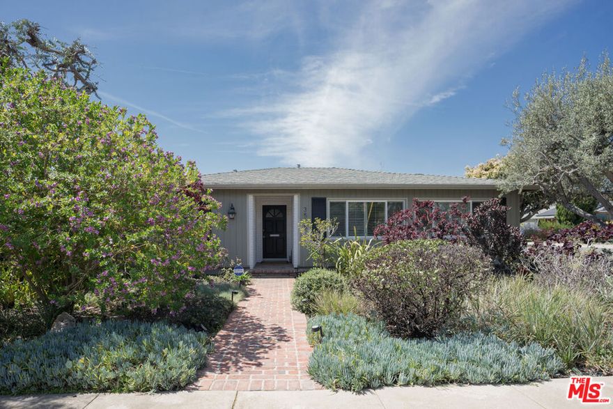 Nestled on the corner of a serene residential street in Mar Vista, this exceptional home boasts a bright and open design that exudes contemporary style and elegance. As soon as you step inside, natural light pours into the expansive living space, effortlessly connecting with the adjacent dining area and kitchen to create a warm and inviting atmosphere. The well-appointed kitchen is a culinary enthusiast's dream, featuring a large breakfast bar, stainless steel appliances, and ample storage space for all your cooking essentials.  From the living area, two sets of French doors lead to an expansive outdoor patio and detached garage. The garage has been thoughtfully refinished, providing versatile space that can easily be used as a home guest space, gym, studio or office. The primary suite is a luxurious retreat, created by combining two bedrooms to create a spacious oasis of relaxation. Boasting an oversized soaking tub, dual vanity and a walk-in closet, this space offers a serene escape from the bustle of everyday life. The second bedroom is equally stunning, with natural light streaming in and an adaptable layout that could serve as a guest bedroom or home office.  Available for immediate move-in, this impressive home offers a unique opportunity to experience the best of Southern California living in one of the most sought-after neighborhoods in the city.