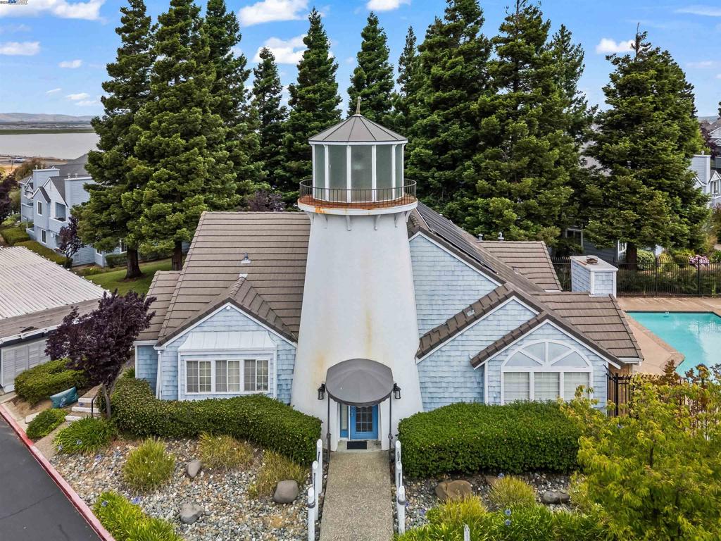 Discover the charm of 405 Lighthouse Dr, Vallejo, a convenient lower unit retreat boasting a one-bedroom, one-bathroom unit. Relax on your private porch and enjoy amenities like a sparkling swimming pool, gym, garage, and storage. Ideally located near Highways 37 and 80 for perfect weekend getaways to nearby Napa Valley wine country, Mare Island, or a day at Six Flags Discovery Kingdom. Walking distance to the marina for effortless city ferry commutes. This is Bay living at its finest.