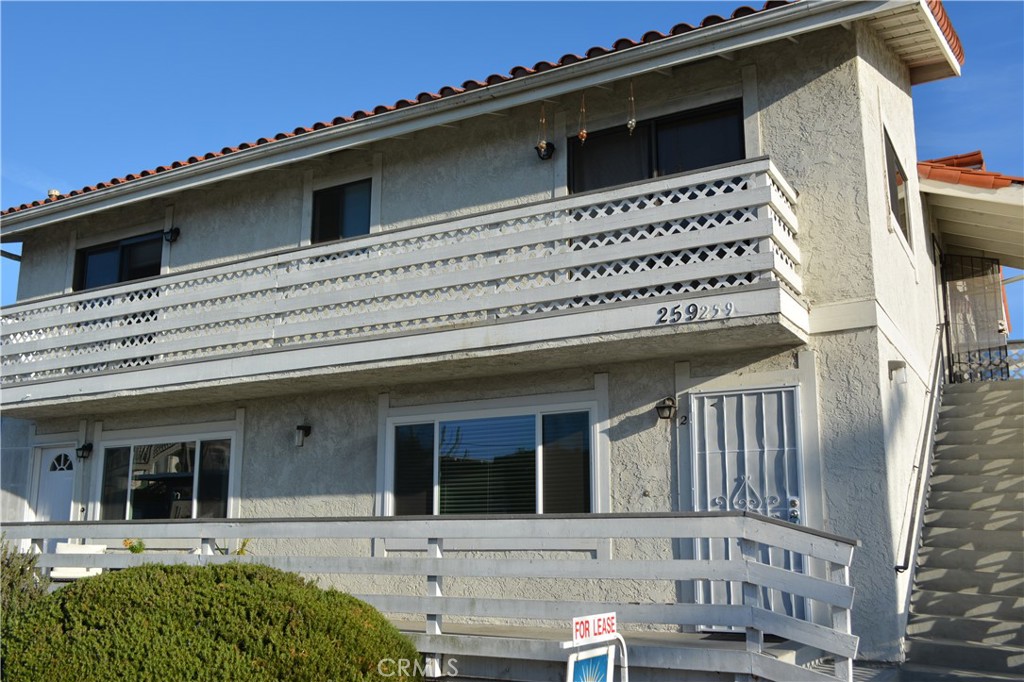 Prime location close to San Clemente Pier and Downtown shopping and restaurants. This spacious two bedroom beach home is light bright and airy . There is a spacious deck off the master bedroom which looks over a picturesque coastal canyon. The offering includes subterranean parking for two cars and a storage closet. Fresh paint and updated bathroom have scheduled completion 9/4/25. (Water and hot water , trash and gardener included)
