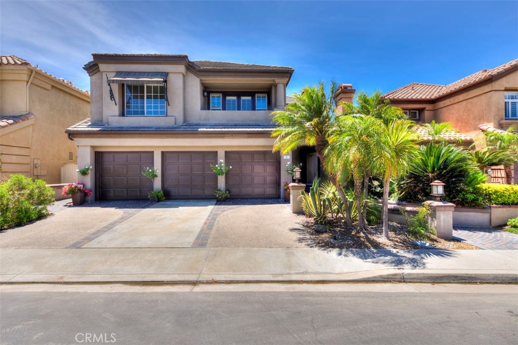 Wake up each morning to stunning views of the signature 16th tee on the exclusive Jack Nicklaus Signature Design Dove Canyon Golf Course - the only one of its kind in Orange County. This elegant, turnkey home is located in the 24-hour guard-gated Dove Canyon community and offers a rare blend of luxury and resort-style living. Additionally, this rare south-facing hidden gem provides the most natural sunlight and ideal temperature all day and all year long.
Features include 4 spacious bedrooms, 4 bathrooms, and a versatile upstairs bonus room. The popular floor plan offers a downstairs en-suite bedroom, formal living and dining rooms with vaulted ceilings and fireplaces, and a bright family room with built-ins and French doors that lead to a lush backyard and custom patio. The chef’s kitchen boasts a large peninsula, stainless steel appliances, a breakfast bar, and panoramic golf course views.
Upstairs, the oversized primary suite features a cozy fireplace, soaring ceilings, private balcony access, and breathtaking views of the golf course and surrounding hills. The primary bath includes dual sinks, a soaking tub, walk-in shower, and a large walk-in closet. Additional highlights include indoor laundry, a powder room, and a 3-car garage with ample storage.
Dove Canyon amenities include a saltwater pool & spa, tennis and pickleball courts, summer concerts, scenic trails, playgrounds, and top Capistrano schools. Low HOA and property taxes, plus easy access to toll roads, shopping, dining, and hiking.