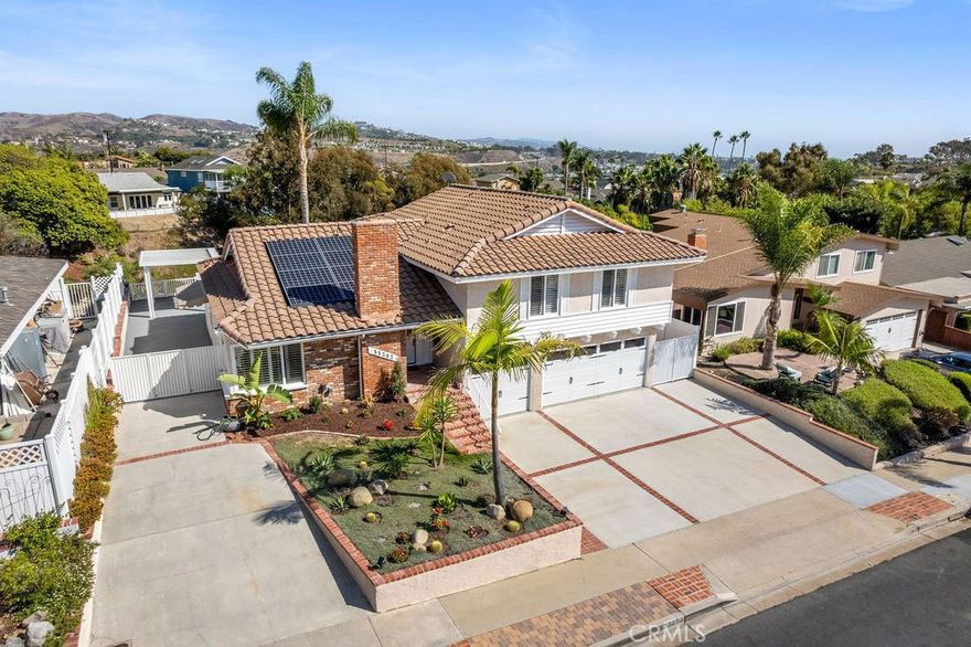 An outstanding opportunity to lease this beautifully maintained single-family residence in the highly sought-after Thunderbird Capistrano community of Dana Hills. This spacious and light-filled 4-bedroom, 3-bathroom home offers a rare combination of comfort, privacy, and functionality. The property features a generous, fully fenced and terraced backyard, approximately 10,212sqft lot, perfect for entertaining or relaxing after a long day, with mature fruit trees and peekaboo ocean views. Outdoor living is further enhanced by a large upper-level deck connected to the backyard via stairway, along with multiple paved patio areas ideal for gatherings or quiet evenings. Inside, the main level welcomes you with a bright and open living area featuring a cozy fireplace and plantation shutters. The kitchen overlooks the backyard and includes a casual seating area for easy conversation while cooking. Adjacent to the kitchen, the dining space flows directly into the main living room, creating a seamless space for entertaining. Step down to the lower level, where a spacious family/bonus room includes a built-in wet bar and direct access to the outdoor patio—perfect for additional family living space, a media room, or a work-from-home setup. The upper level offers four well-appointed bedrooms, including a generous primary suite with a tastefully upgraded bathroom, custom closet, and private sliding door access to the upper deck. Additional highlights include a three-car garage with direct access from the bonus room, extra driveway parking for three vehicles, and a rare RV-sized parking area along the side of the home. This home is located just a short walk from Thunderbird Park, which features a playground, picnic areas, a half basketball court, and a sports field. You're also minutes away from Doheny Beach, Dana Point Harbor, the Lantern District, and Ocean Ranch Shopping Center with Trader Joe’s, Cinepolis Luxury Cinemas, restaurants, and more. With easy access to the 5 Freeway and a highly desirable coastal lifestyle, this is truly a must-see property that offers the best of South Orange County living.
