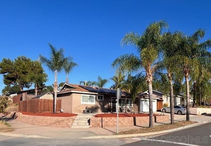 It’s not just a home, it’s a lifestyle. 3 bed, 2 bath entertainers dream with 2 yards- 1 off the wide sliding glass door to a large covered  patio complete with 3 skylights. Owners currently uses as a leisure area with pool table, dart board, fireplace and eating area. Large covered side yard, with a beautifully built shed and tons of room, all concrete and covered. Before you approach the stairs is a dog area and another shed. Up the stairs is an outdoor kitchen (complete with Baja style swings) and plenty of room to gather around the island as well as a built in fire pit area and a relaxing pool. The home boasts 3/2 with a beautiful kitchen with walk-in pantry and appliance center. The Living Room has a wood burning fireplace with custom lights. The bedrooms all have mirrored wardrobe doors and ceiling fans.  Award winning schools, 21 miles to the beach, 22 miles to the airport and 18 miles to downtown SD.  Information believed accurate but Buyer and Buyers' agent  should verify all before before releasing contingencies.