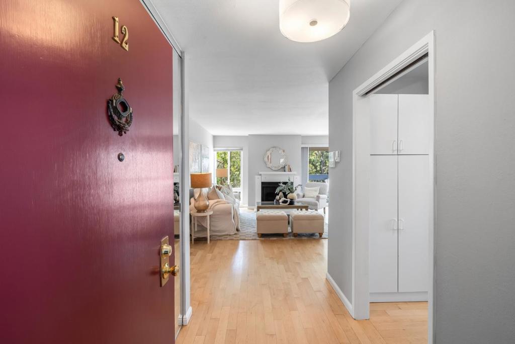 Dont miss the lowest priced 3BR condo in Foster City! Penthouse-style elegance awaits in this impeccably appointed 3BR/2BA corner residence, ideally situated within the coveted Sand Harbour community. Spanning approximately 1,288 sq ft, the thoughtfully designed layout showcases expansive double-pane windows that grace the interior with natural light, highlighting engineered floors, sophisticated crown moldings, and a freshly painted designer palette. The formal entry leads to a spacious living room, anchored by a classic fireplace and access to a private balcony, while seamlessly flowing into a dining area framed by a stunning wall of glass. Bright and functional, the eat-in kitchen boasts generous food prep space, sleek modern countertops, crisp white cabinetry, and stainless steel appliances. Down the hall, the private primary suite offers a tranquil haven with a generous walk-in closet and a beautifully remodeled en suite bath. A well-appointed second bedroom, an updated hall bath, and a full-size laundry room complete the interior. Residents enjoy resort-style amenities including a pool, spa, fitness center, and clubhouse, along with a covered parking space and plentiful guest parking. Conveniently located near top-rated schools, the Bay Trail, shops, and commute routes.