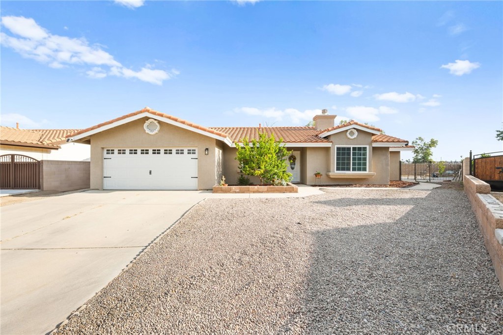 This is your opportunity to own a charming single-story home on a spacious 7,840 sq ft lot. Offering 1,629 sq ft of living space, 3 bedrooms, 2 bathrooms, and a 2-car garage, this property has the perfect balance of comfort and function. Step inside to find an inviting layout with open living and dining areas, ideal for gatherings and everyday living. The kitchen provides plenty of cabinet and counter space, making meal preparation simple and convenient. The master suite serves as a relaxing retreat with an attached bathroom, while the secondary bedrooms are well-sized and versatile for family, guests, or even a home office. Outside, the backyard features a concrete patio, ready for entertaining or enjoying the outdoors, while the front yard with gravel landscaping adds curb appeal and low maintenance. The wide driveway provides extra convenience and parking space. With no HOA and a low tax rate of only 1.156%, this home offers flexibility and affordability. Conveniently located just 1 mile from grocery stores, restaurants, and local parks, it’s the ideal combination of peaceful living and everyday convenience. Don’t wait—schedule your showing today!