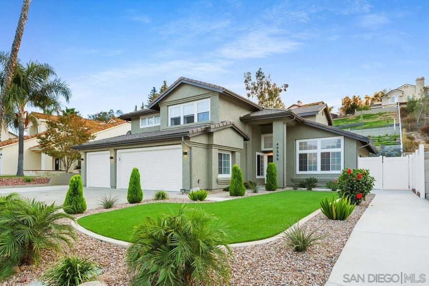 Modern Multi-Generational Estate w/ Smart Upgrades, Solar & Panoramic City Views 40599 Calle Medusa, Temecula, CA 92591. 6 Beds | 4 Baths | 3-Car Garage | Approx. 14,375 Sq Ft Lot Offered at $1,099,000. Welcome to this thoughtfully upgraded, move-in-ready estate offering panoramic city views, high-end smart home systems, & a flexible layout ideal for multigenerational living. Located just minutes from Temecula Wine Country on a premium upslope lot in a quiet no-HOA neighborhood, 40599 Calle Medusa delivers both tranquility & freedom—without sacrificing access to shopping, schools, or entertainment. Terraced Views & Outdoor Lifestyle Perched above the street with a tiered backyard layout, this home offers stunning views & seamless indoor-outdoor flow. Whether you're sipping coffee at sunrise or hosting a sunset BBQ, the elevated setting provides a scenic, private retreat ideal for entertaining or relaxing. Smart Energy Upgrades for Long-Term Value: Fully-owned solar system with 2 Tesla-style battery backups. New A/C heat pump, all-new ducts and vents. High-efficiency tankless water heater, New roof with double-layer underlayment, Updated plumbing & electrical, Smart LED lighting & programmable switches, 6” seamless gutters w/ direct drainage, Full suite of fire safety features, Flexible Floor Plan for Modern Living. Main Level: 2 bedrooms + full bath (One with private entrance & patio—perfect for in-laws, guests, or a rental studio). Dedicated home office, Open access to kitchen, dining, & living areas. Oversized 3-Car Garage w/ Storage & EV Charging. See supplement for more  Modern Multi-Generational Estate with Smart Upgrades, Solar & Panoramic City Views 40599 Calle Medusa, Temecula, CA 92591. 6 Beds | 4 Baths | 3-Car Garage | Approx. 14,375 Sq Ft Lot Offered at $1,099,000. Upper Level: • Expansive primary suite with walk-in closet • Private mini-suite with ensuite bathroom • 2 additional bedrooms with a shared bath • All 4 bathrooms renovated with Kohler, Moen, and designer tile finishes Chef-Inspired Kitchen & Whole-Home Connectivity • Brand new Samsung appliances • Sleek quartz countertops + oversized single-basin sink • Modern soft-close cabinetry • Upgraded plumbing, lighting, and electrical • Open layout to dining and family rooms • Wall-mounted Wi-Fi access points throughout • TV-ready wiring in every bedroom,  Clean epoxy flooring, installed EV charging station, custom storage solutions + dual attic access, Laundry zone with new washer/dryer and utility sink, sound-isolated and safety-equipped backyard Oasis with Outdoor Kitchen & Fruit Trees, custom outdoor kitchen with Bull BBQ grill, side burner, sink, and stainless storage, Two outdoor showers (upper & lower levels), 31 mature fruit trees for seasonal harvest, artificial turf + gravel beds, trellis post bases ready for customization (lumber included), lower-level enclosed patio with separate entry—ideal for a gym, guest suite, or creative space, vinyl fencing with solar accent lighting. Minutes to Wine Country, No HOA, Unlimited Potential Enjoy the freedom to personalize your property—RV parking, garden beds, ADU, or future expansion—all without HOA restrictions. Located just minutes from award-winning wineries, scenic trails, and Temecula’s best dining and shopping, this home offers a lifestyle that’s both relaxed and refined.