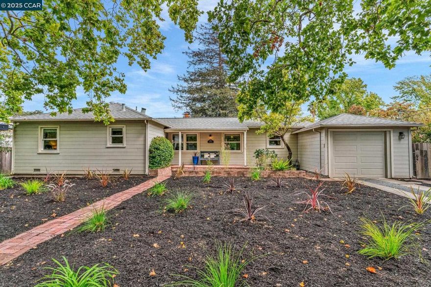 Nestled on a tree-lined and picturesque cul-de-sac, this light-filled, beautifully appointed home is located in the convenient and coveted Saranap neighborhood! Inviting brick porch, gleaming newly refinished oak hardwoods, fresh paint, dual pane windows, designer lighting, elegant stone fireplace surround, and a recently updated bathroom with stone counters, custom cabinetry, and rich tile finishes, and walls of windows looking out to the enchanting setting. The sunny East-facing kitchen features stainless steel appliances, gas range oven, impressive stone counters, a breakfast nook, views of the private garden setting. Adjacent to the kitchen is an combined office and laundry room/mud room which leads out to the one-car garage. The large level lot features filtered views of Mt Diablo, a backdrop of majestic mature trees, raised garden beds, Napa-style plantings, colorful and fragrant foliage, roses, brilliant tulip tree, brick and stone paver entertaining patio, and plenty of room for future home expansion or endless landscape ideas! Prime location, easy commuting access, top-rated schools, nearby open space, and a convenient stroll to downtown amenities, world-class shopping and restaurants.