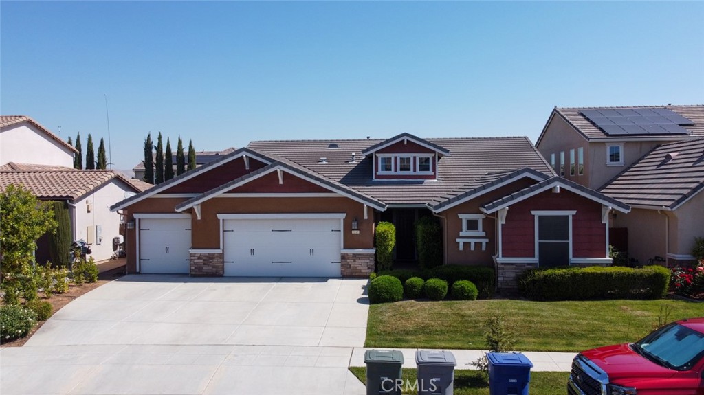 Former Florentine Model Home in a Prime Cul-de-Sac Location! Welcome to this beautifully appointed single-story home by Century Communities, nestled in a quiet and sought-after cul-de-sac. This former Florentine model home offers 3 bedrooms, 2.5 bathrooms, and a versatile den with French doors leading to the backyard—perfect as a home office, gym, or bonus space. Step into the elegant formal dining room, ideal for hosting special occasions, and gather in the spacious great room complete with a ceiling fan. The chef’s kitchen is a standout with granite countertops, a decorative tile backsplash, stainless steel appliances, and a breakfast bar. The primary suite is thoughtfully located apart from the secondary bedrooms, offering privacy and tranquility. It features dual vanities, a separate soaking tub and shower. The two additional bedrooms are connected by a convenient Jack-and-Jill bathroom with dual sinks. Enjoy the convenience of an indoor laundry room with built-in cabinetry, and a fully finished 3-car garage that is insulated, textured, and painted. Step outside to the beautifully landscaped backyard with mature plantings, potted greenery, and extended concrete patio. This home is a rare blend of comfort, functionality, and thoughtful upgrades.