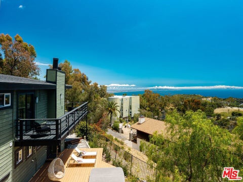 Photo of 21625 Saddle Peak Road, Topanga, CA 90290 (MLS # 26842963)