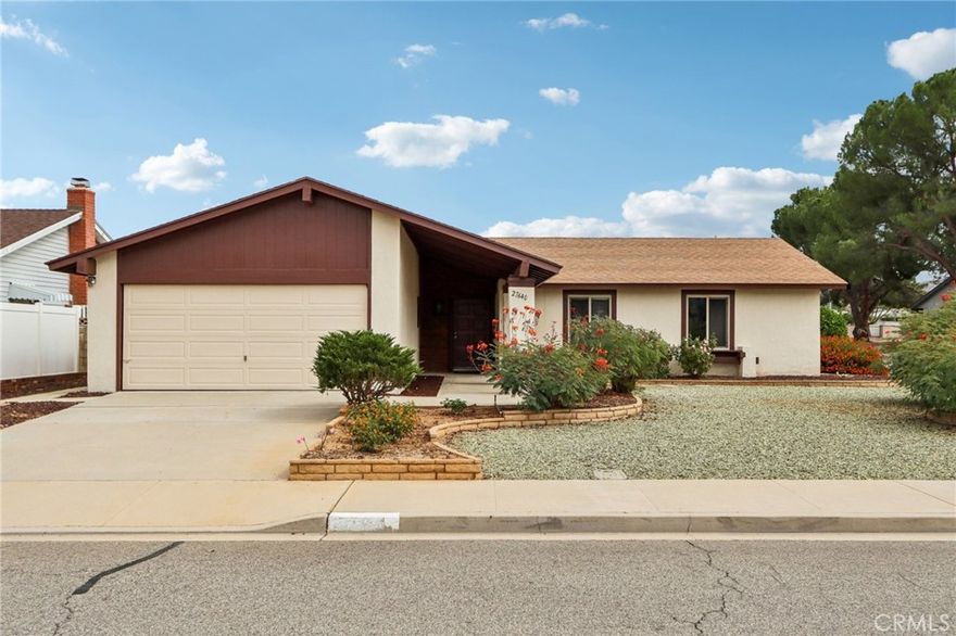 Welcome to 27640 Camden Way in Menifee’s desirable 55+ senior community. This charming single-story home sits on a corner lot and features a newer A/C unit, fresh interior and exterior paint along with brand-new carpet throughout. The spacious living room connects seamlessly to the formal dining area and includes a classic brick wood-burning fireplace and a large sliding glass door that fills the space with natural light. The kitchen has been updated with new flooring, oak cabinetry, white appliances, and offers space for a cozy breakfast table. A dedicated office with built-in shelving makes the perfect spot for a book collection or home library. The primary bedroom is generous in size and includes an en-suite bathroom, walk-in closet, and a convenient sewing station. The secondary bedroom is also spacious and features a wall-to-wall closet for ample storage. The home also offers a dedicated laundry room and an attached two-car garage for added convenience. Outside, enjoy two covered patios and low-maintenance landscaping—ideal for relaxing or entertaining. The corner lot provides potential RV parking access in the backyard. Low taxes and low HOA with community amenities including a club house, pool, spa, tennis courts, gym, and multiple other activities.