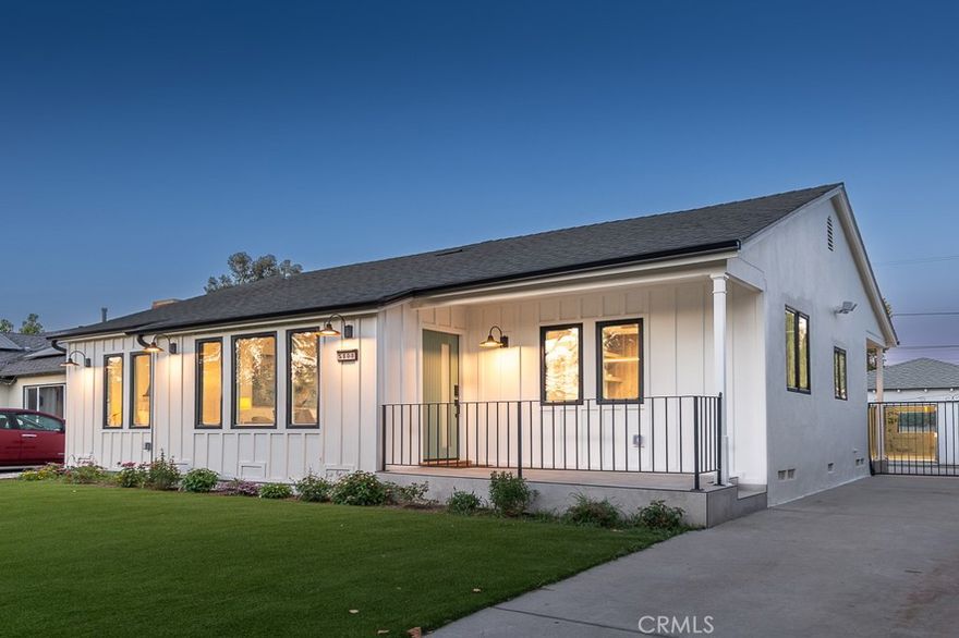 Major price adjustment!    Amazing home.  Welcome to this beautifully remodeled single-story home, in a vibrant North Hollywood neighborhood. This warm and inviting home with modern sophistication offers a comfortable and luxurious living experience with just under 1400 sq ft, 3 bedrooms and 2 baths, providing ample space for both relaxation and entertainment. The charming light-filled living room looks out onto the lush front yard, and flows seamlessly into the dining room with custom cabinets, and a brand new custom kitchen featuring gorgeous new cabinets, quartz countertops, and brand new black stainless steel Samsung appliances. The primary bedroom features an en-suite bathroom, providing a personal retreat for the homeowners, a wall of closets and access to the tranquil backyard. The two additional bedrooms both have ample closet space. The second bathroom is in the hallway with a tub and beautiful quartz countertops on the stylish vanity. The large backyard is so relaxing and peaceful, with fruit trees and a lovely pool. Additional brand new features include doors and windows throughout the home, HVAC ducting, water heater, new interior and exterior paint, landscaping, updated plumbing and much more! The detached two car garage is a great opportunity to convert to an ADU. Conveniently located near shops, dining, entertainment, and with easy freeway access, this gem is move-in ready and waiting to welcome its new owners!