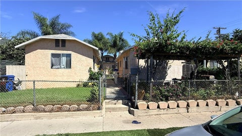 Photo of 823 W 81st ST, Los Angeles, CA 90044 (MLS # SW26202425)