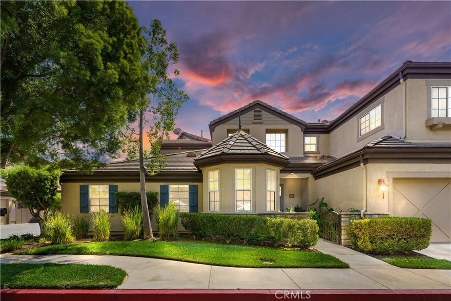 Welcome to the prestigious gated community of Avignon, where elegance and convenience come together. This stunning 2-story end unit home offers 2 bedrooms, 3 bathrooms, and a spacious loft with a highly sought after and unique layout.

The primary suite is conveniently located on the first floor, complete with a cozy fireplace, French doors leading to the private patio, and a luxurious en-suite bathroom. Upstairs, you’ll find another bedroom, a full bathroom, and a massive loft that can easily serve as a second living space, office, or even be converted into an additional bedroom.

Inside, you’ll love the beautiful porcelain floors throughout, a chef’s kitchen with granite countertops, backsplash, and a large eat-in dining area. Natural light floods the open layout, enhancing the warmth and elegance of this home.

Enjoy gorgeous views of the Valencia Country Club and lake from this exclusive enclave. Perfectly situated in the best school district and just minutes away from Valencia’s finest dining, shopping, and entertainment this home truly has it all.