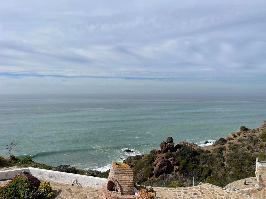 Turn key furnished oceanfront Condominium.  This incredible property is located at a front ocean location in South Rosarito in the State of "Baja California, Mexico, 45 miles south of the San Diego California border to Mexico. it is on the second floor of a three levels building,3 bedrooms, 2 Bathrooms, ceramic flooring throughout, highly upgraded, custom ceiling fans and lights, kitchen and bathrooms tops, one bathroom has a tub with massage whirlpools, unobstructed views to the Pacific Ocean. vaulted ceilings throughout, design with traditional Mexican style and Decor, large barbecue area, new appliances including tank less water heather,1 car assigned space, gated private community with 24/7guard,pool,Jacuzzi, Tennis courts, parks and more awaits for you at  "Plaza Del Mar"