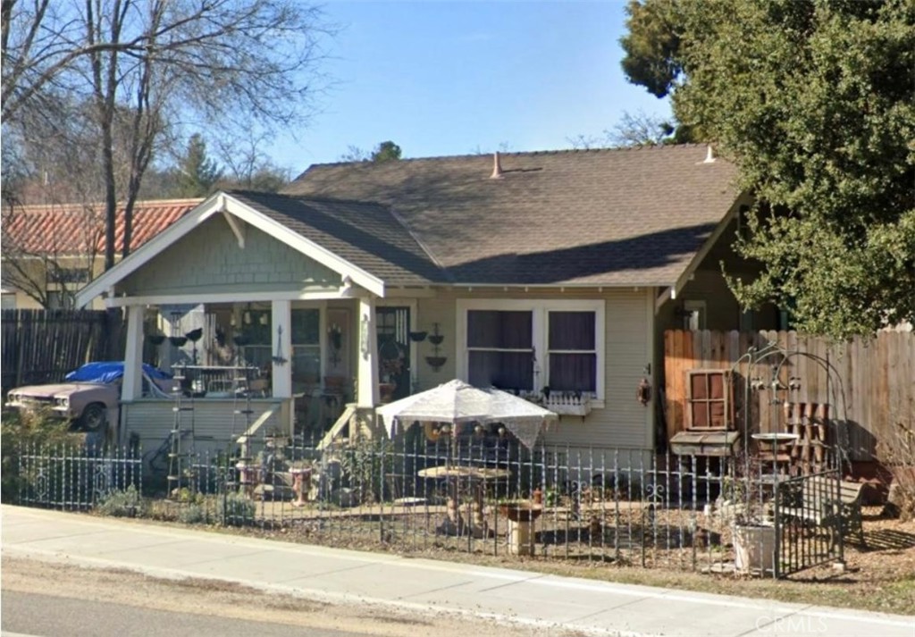 Great opportunity for an investor looking for a Value-Add property. Residential on commercial, non-conforming use on Commercial Professional zoning, CP. There is a small unfinished ADU in back, detached garage & a workshop. Curb, gutter, sidewalk and street lights have already been added. Main house has a long term tenant.